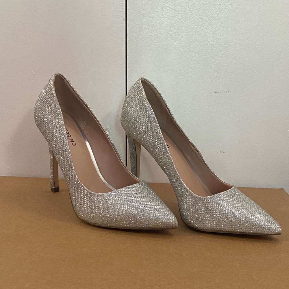 Sparkly silver heels by Call it Spring.